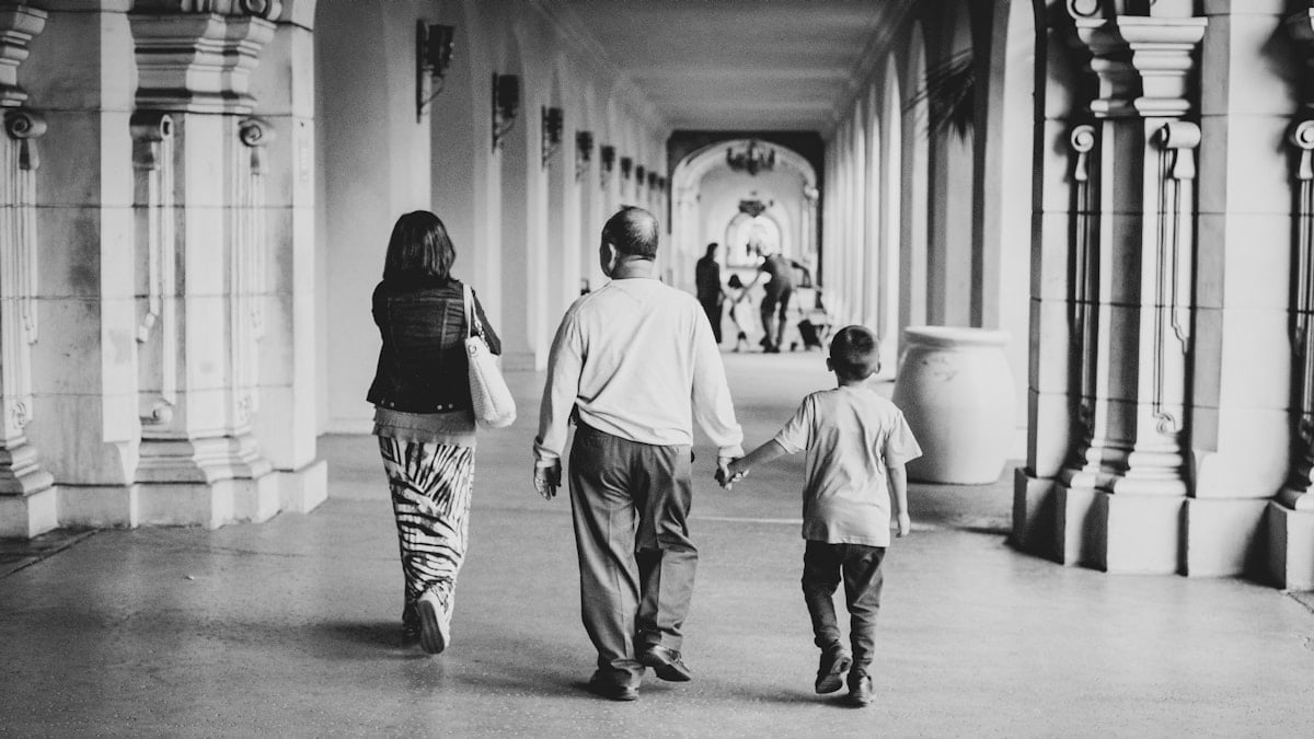 Man walking with child